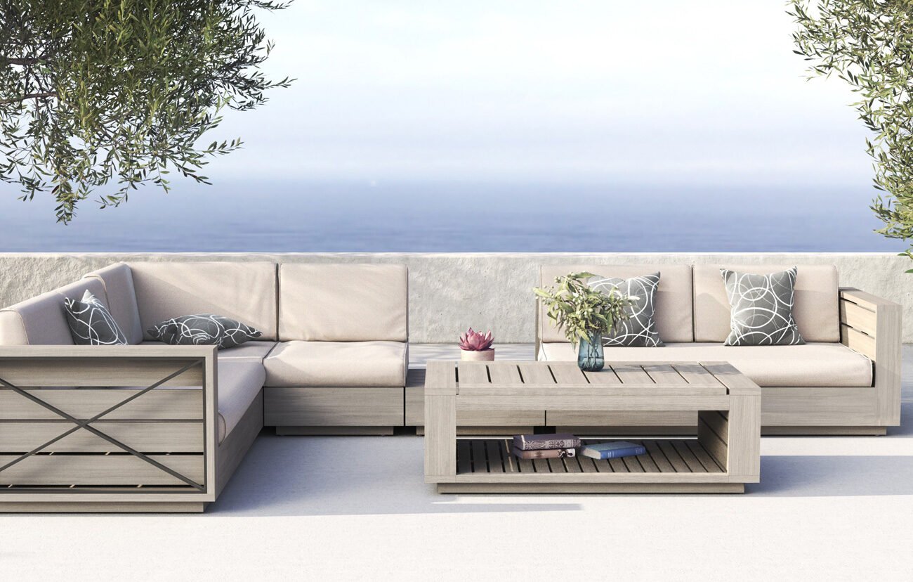Couch set with a lake in background from Insideout patio furniture store