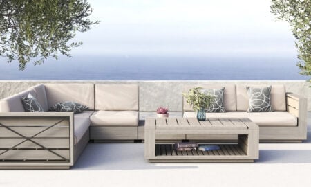 Couch set with a lake in background from Insideout patio furniture store