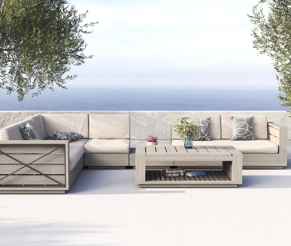 Couch set with a lake in background from Insideout patio furniture store