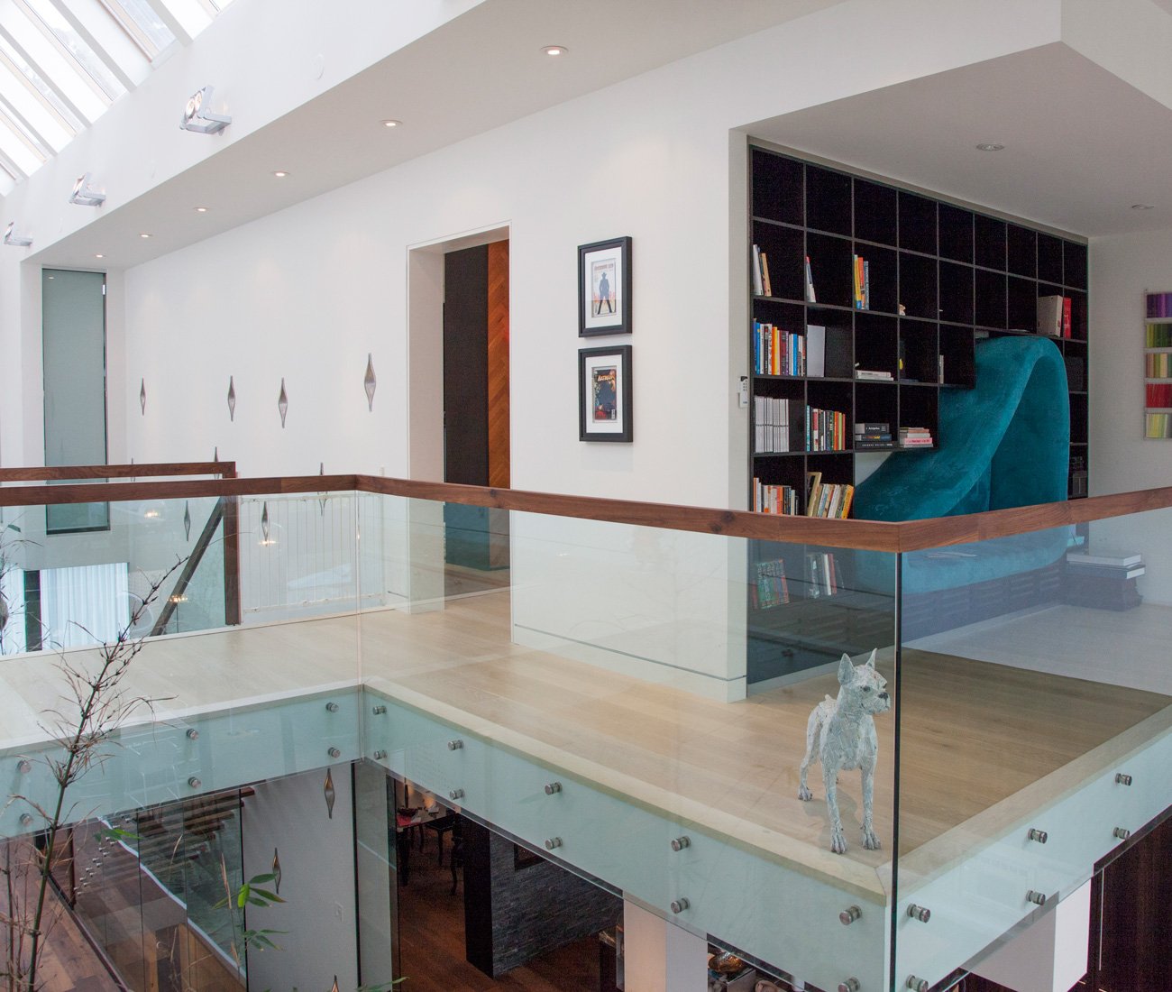 mezzanine bridges the second-storey bedrooms - Prototype Design Lab