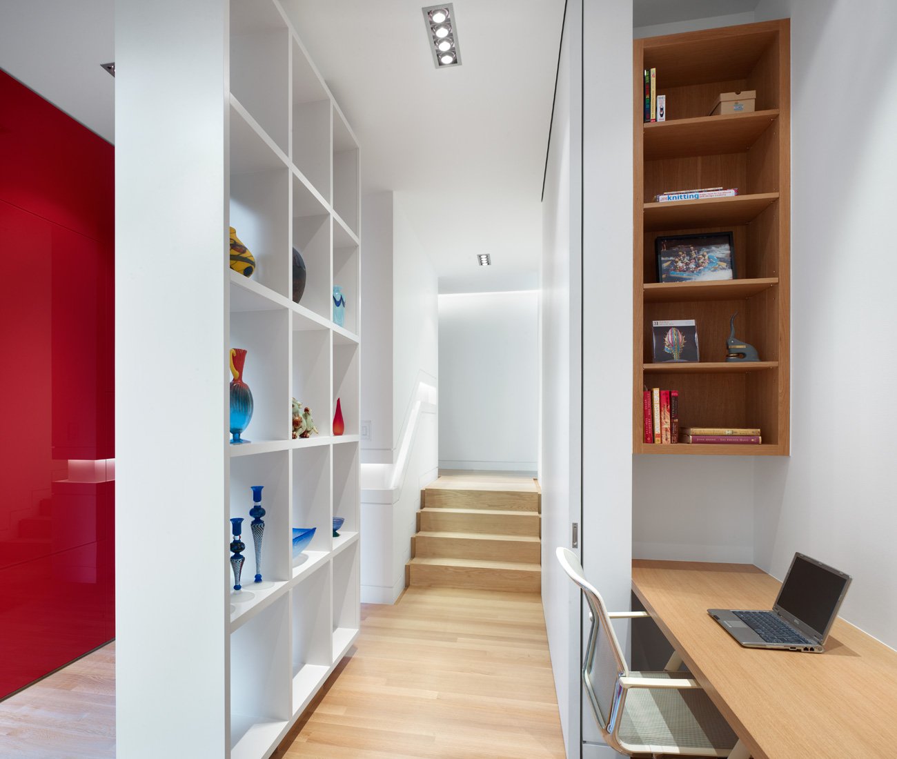 Mediterranean home design with a office that can disappear behind a sliding door. - Kohn Shnier architects