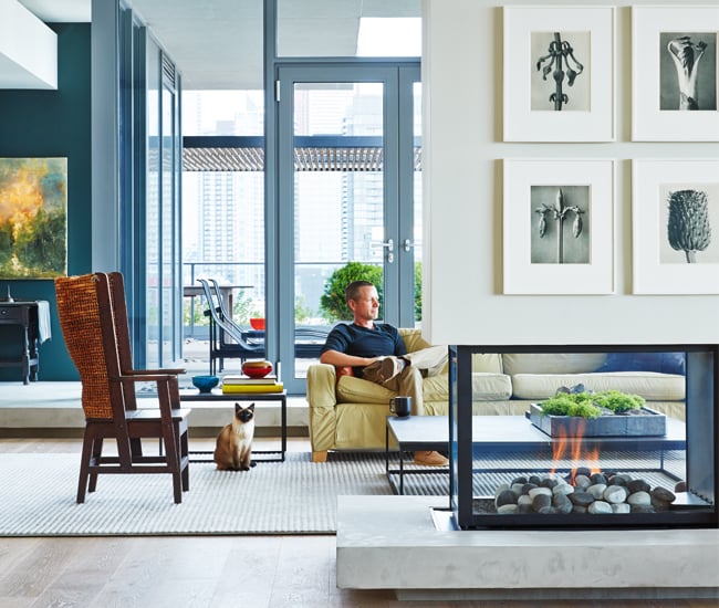 Tom Deacon sitting on sofa