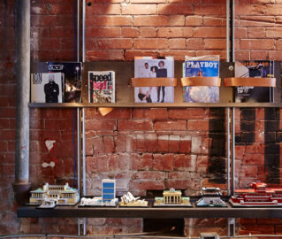 Gadgets and magazines on the shelves