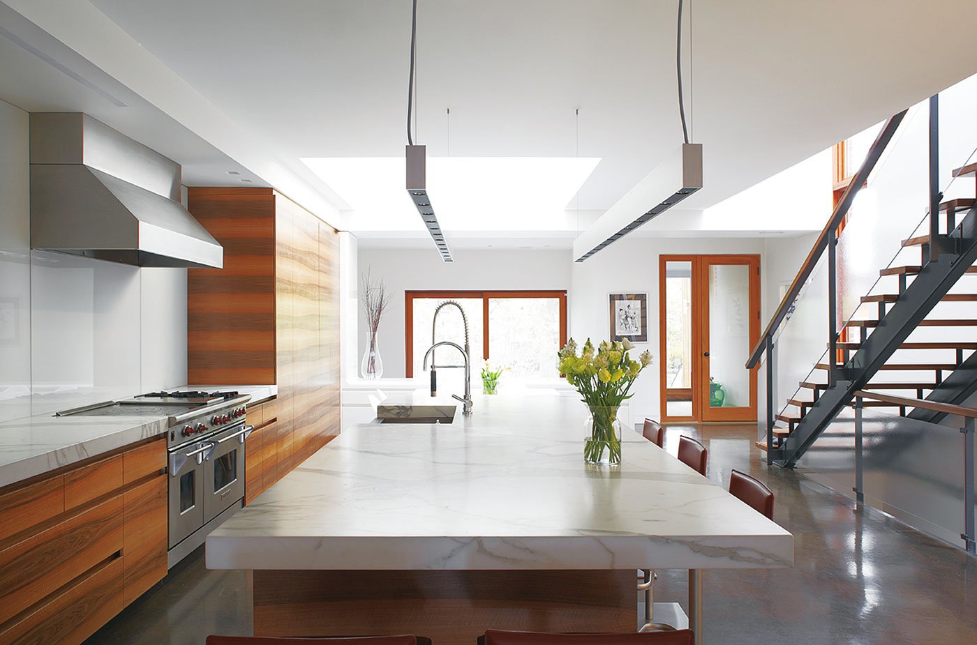 Carrara marble–topped island | kitchen design ideas