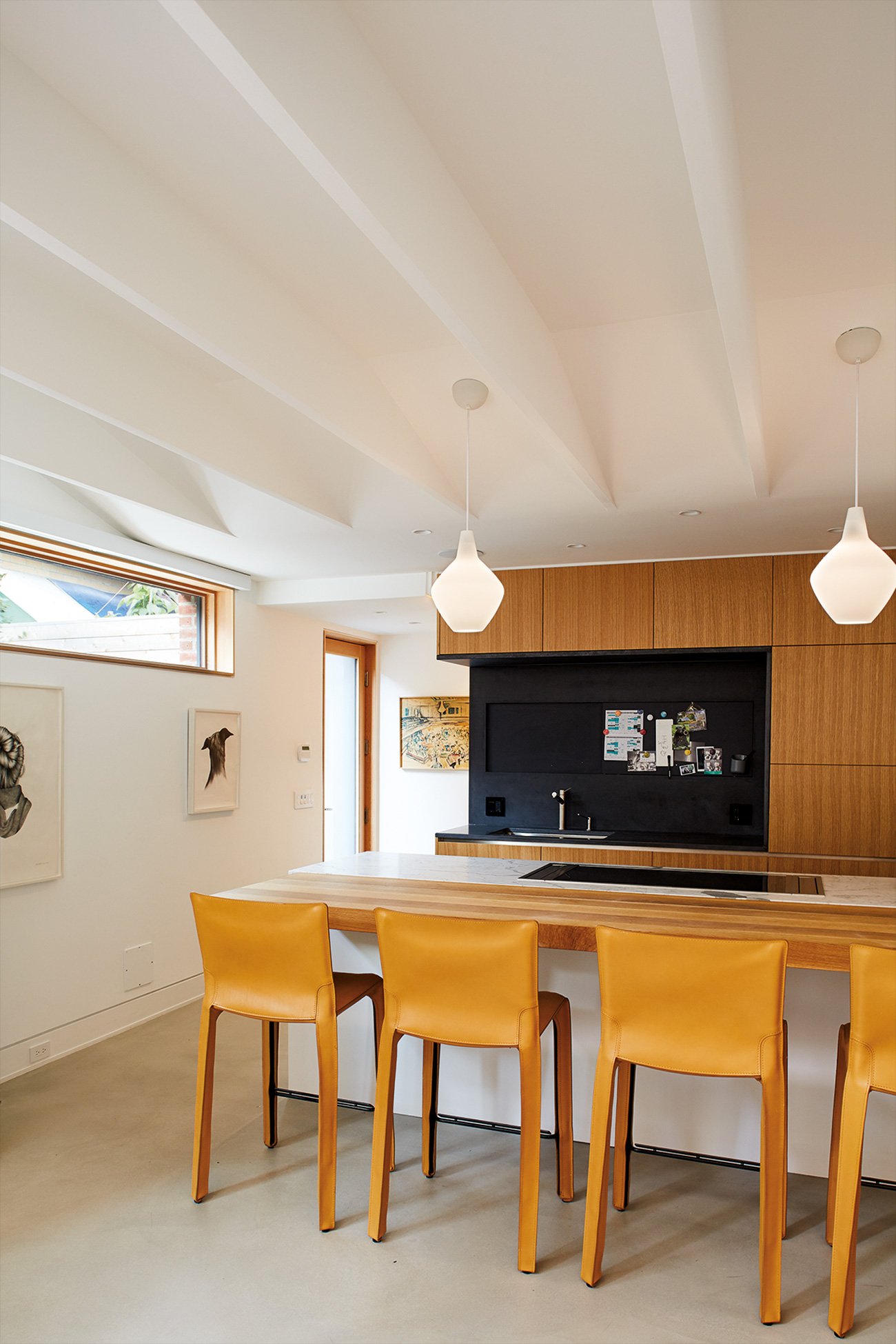 Toronto laneway house kitchen featuring a bifurcated ribbed ceiling