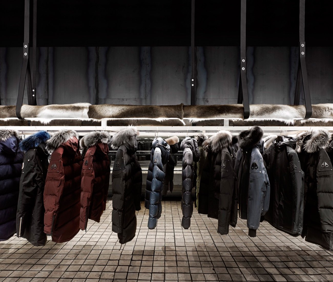 Winter jackets hanging in a store in Yorkdale mall in Toronto