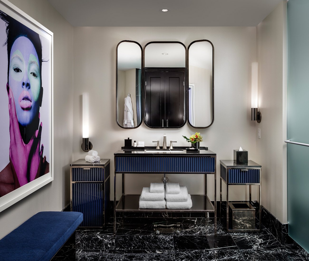 Custom vanity and polished chrome sink in Bisha Hotel’s luxury bathroom designed by Studio Munge