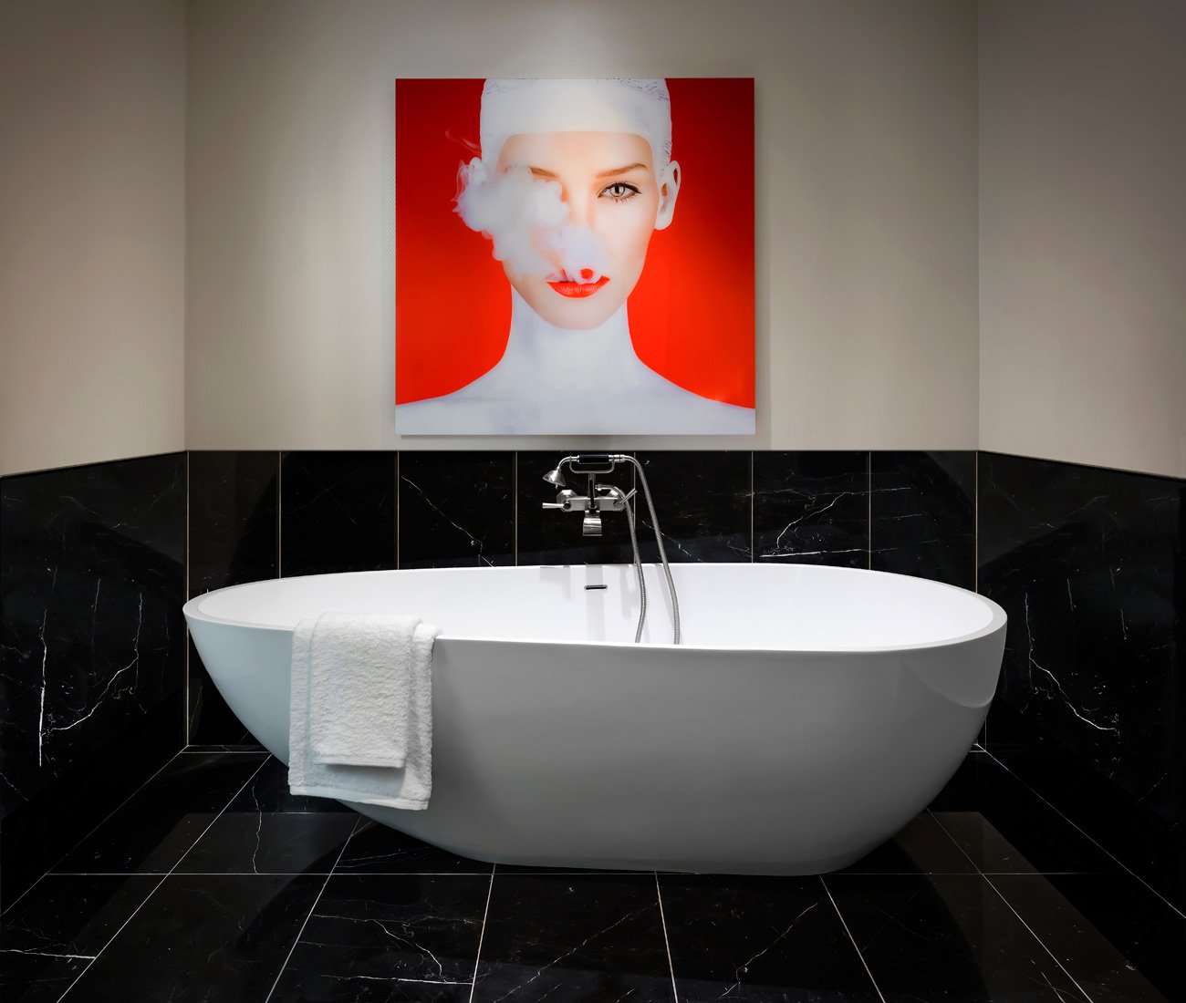 Freestanding bathtub with Nero Marquina marble in Bisha Hotel’s loo, designed by Studio Munge