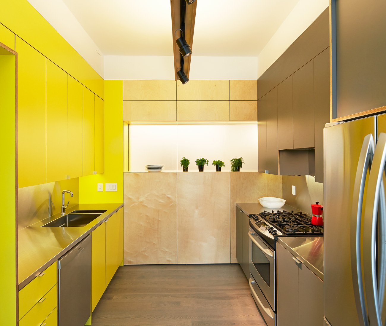Toronto Condo Renovation Yellow Interior IN8 Design Yellow cabinetry in a condo kitchen interiors in Toronto