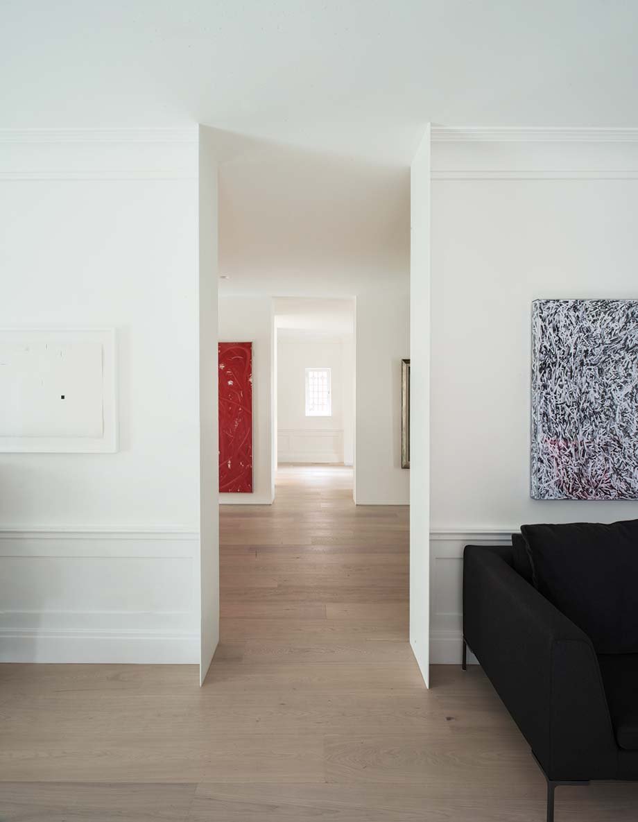 Aluminum “fins,” frame the living- and dining-room doorways - gh3 Edwardian house modern design