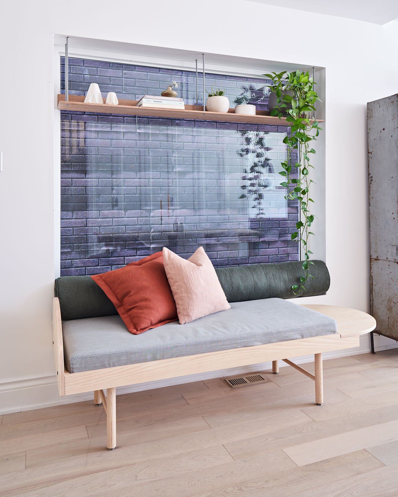 Anna Church Art Riverside Home Designlines Magazine The artist self-designed white oak daybed and floating bookshelf made by Atelier Arking