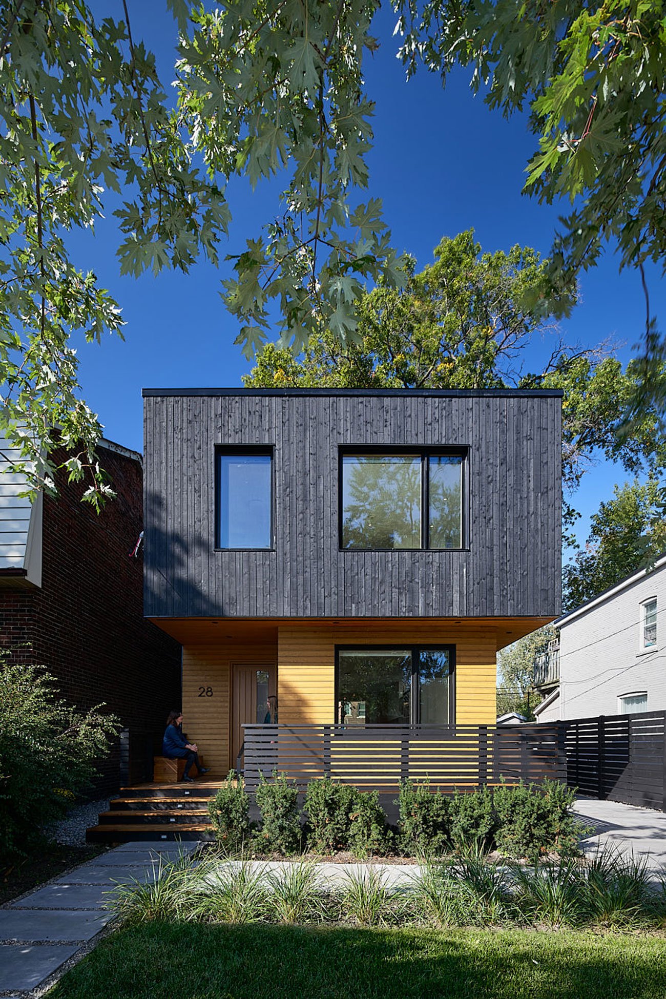 Black Wood siding on a Toronto House by DPO Architecture