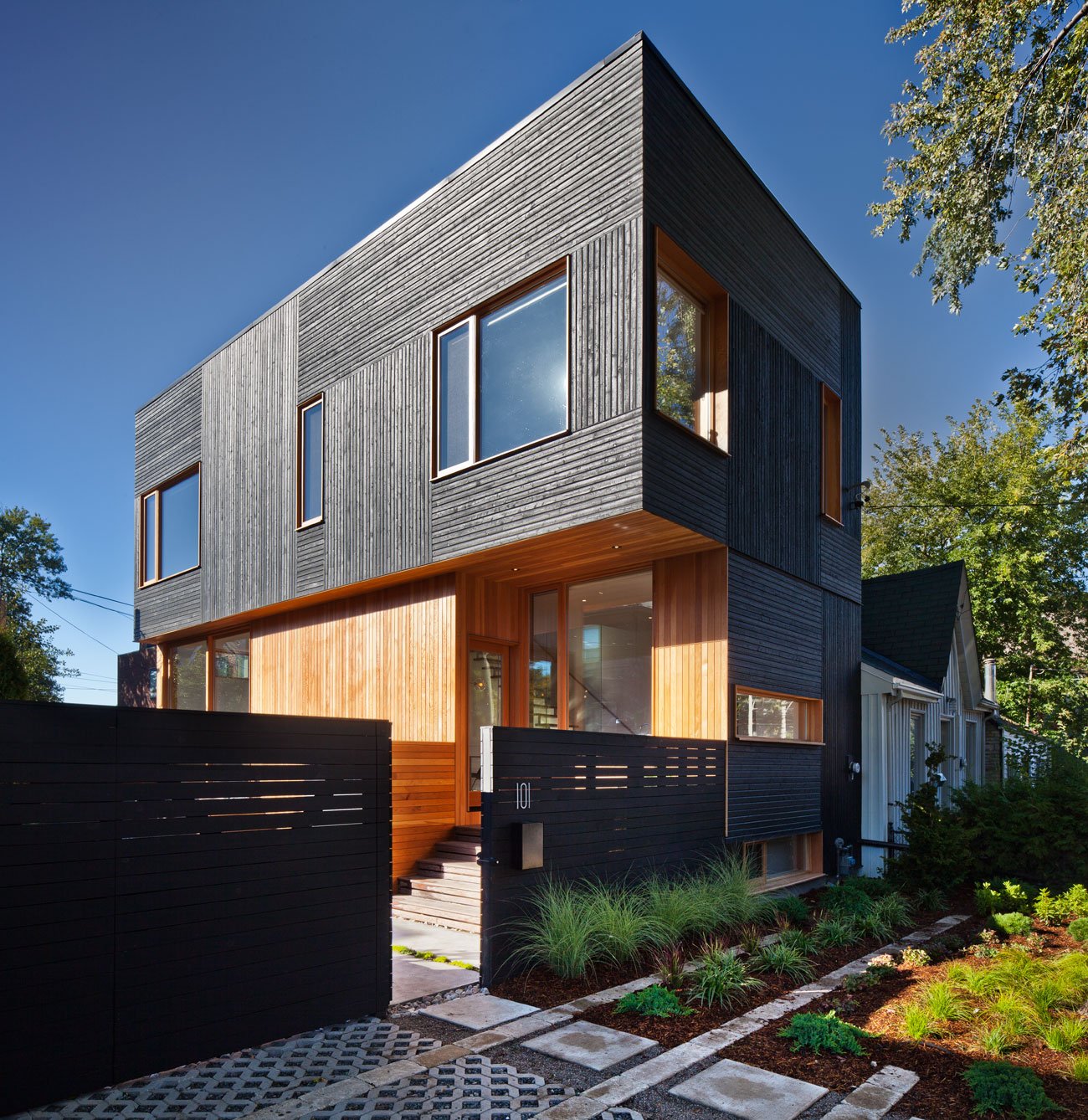 Home exterior wrapped with Black Wood cladding, design by Kyra Clarkson Architect