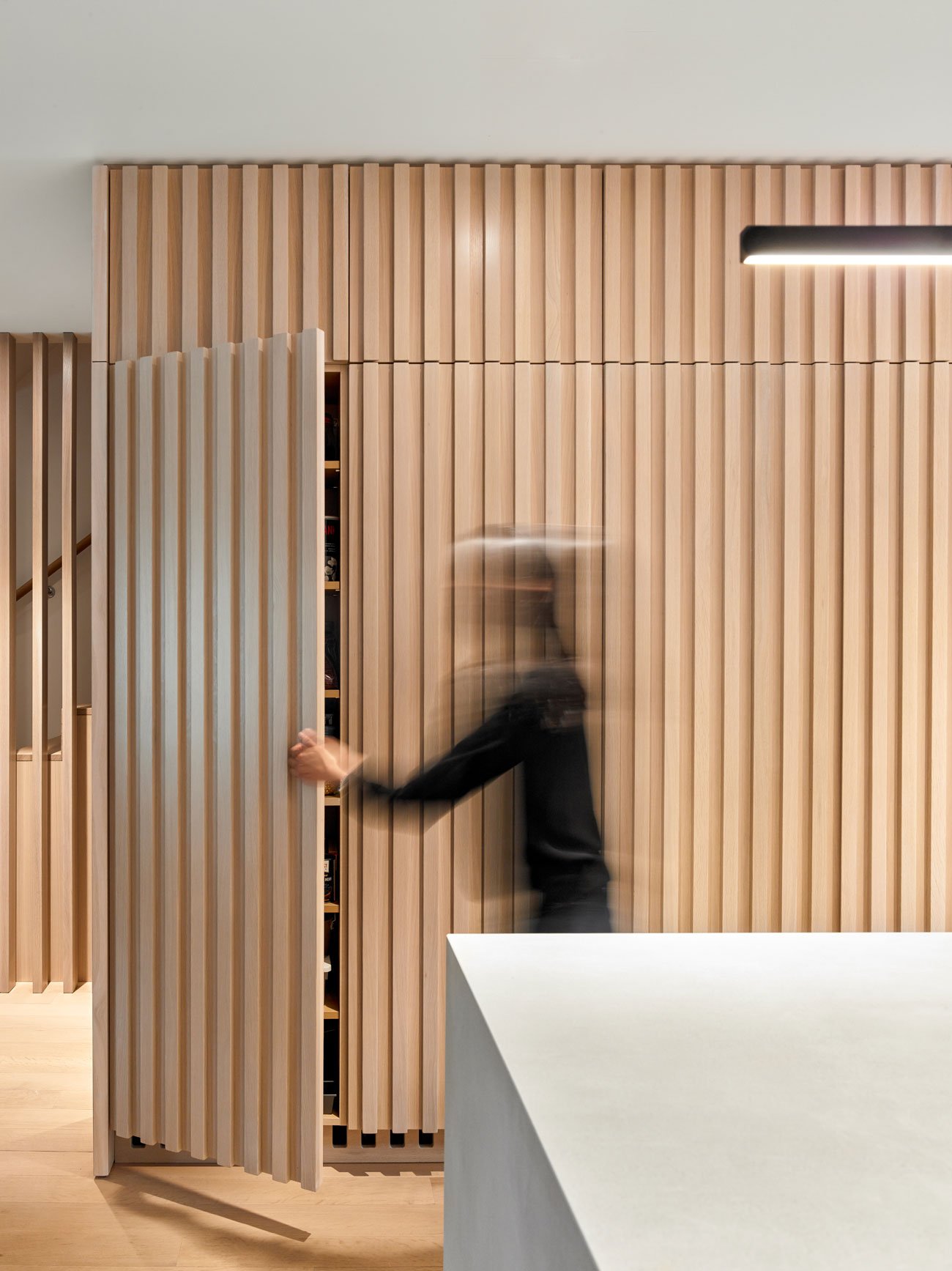  Kitchen Reno by Architect Vanessa Fong featuring vertical slats of white oak wood.