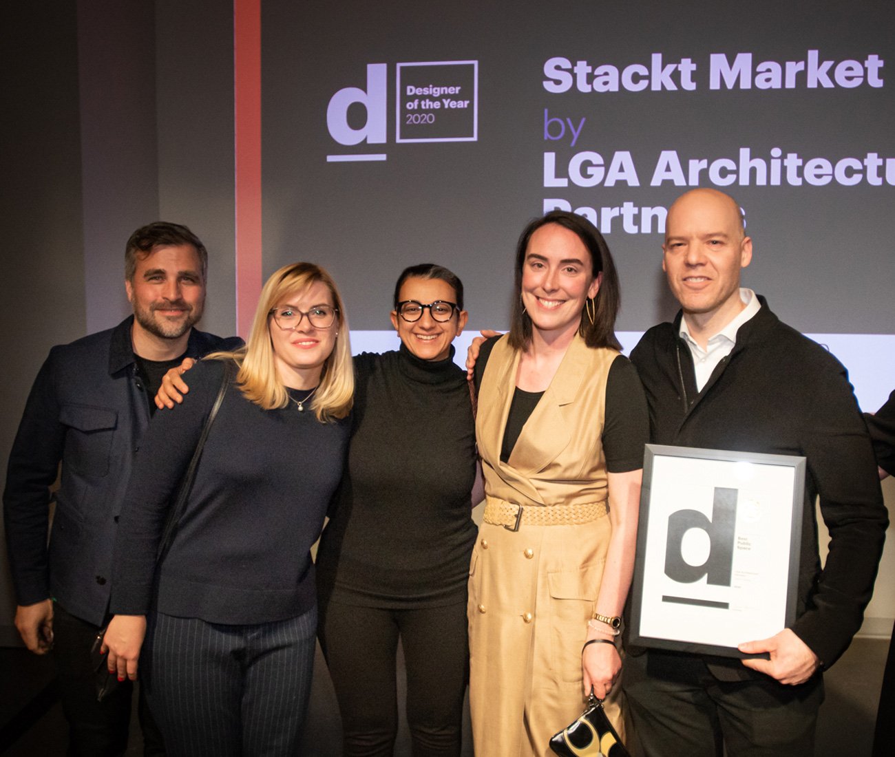 Lead designer Danny Bartman (right) accepted the certificate.