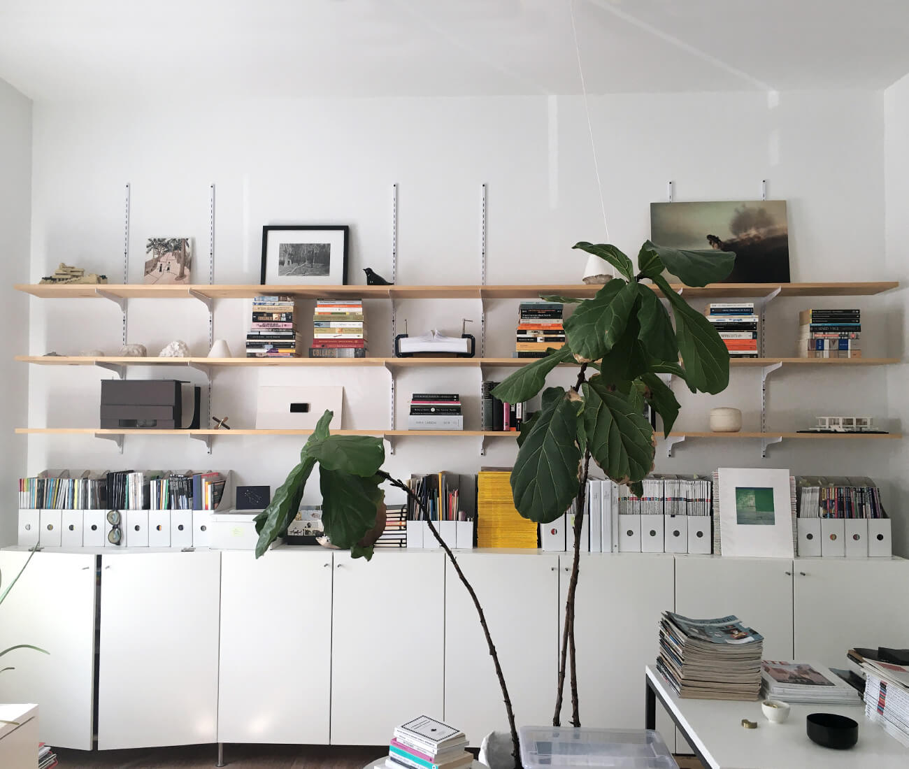 office featuring practical standard and bracket shelving