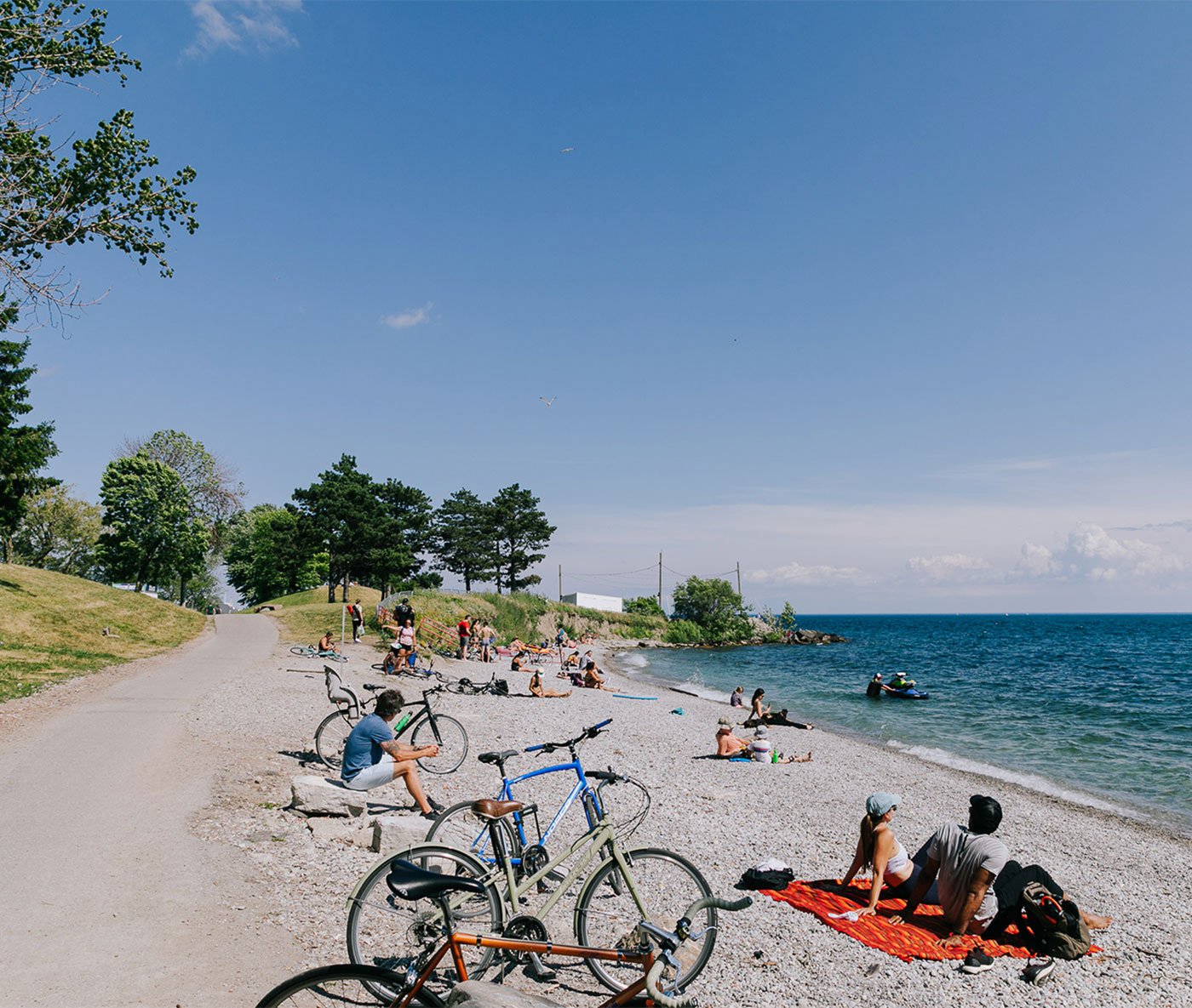 People along the shoreline of Lake Ontario