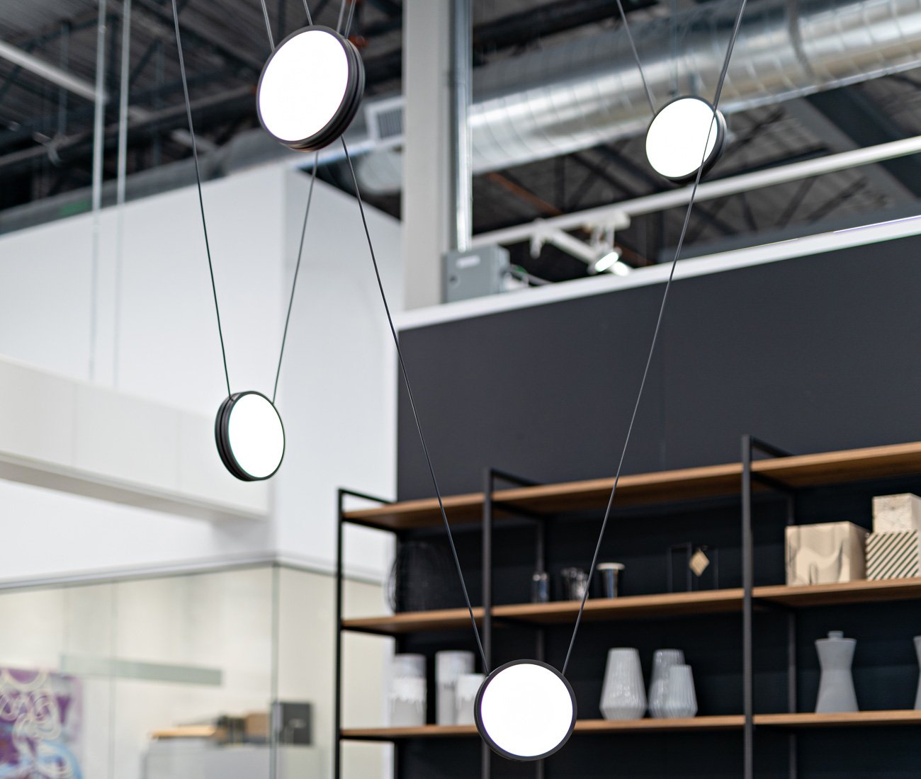 Anony's Highwire pendants.