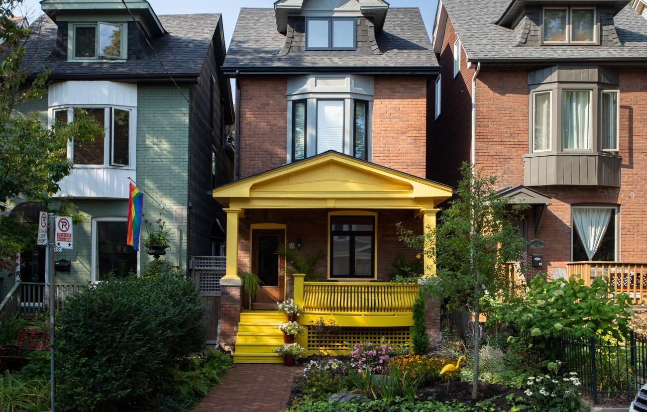 A Toronto home with a yellow Front porch