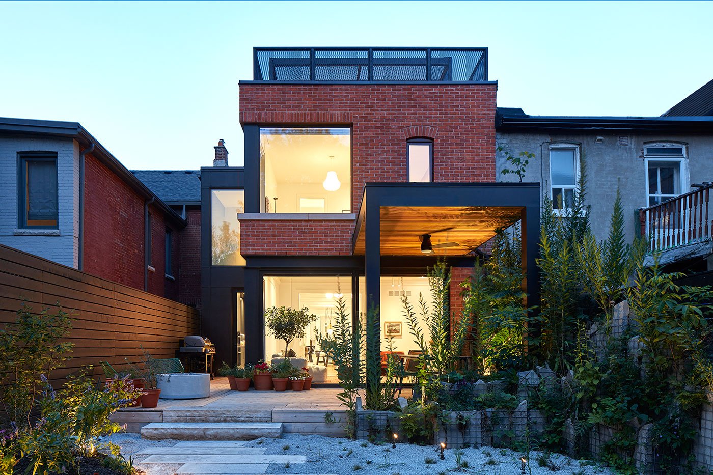 Backyard view of Victorian on Major Street, patio and landscape design by EcoMan