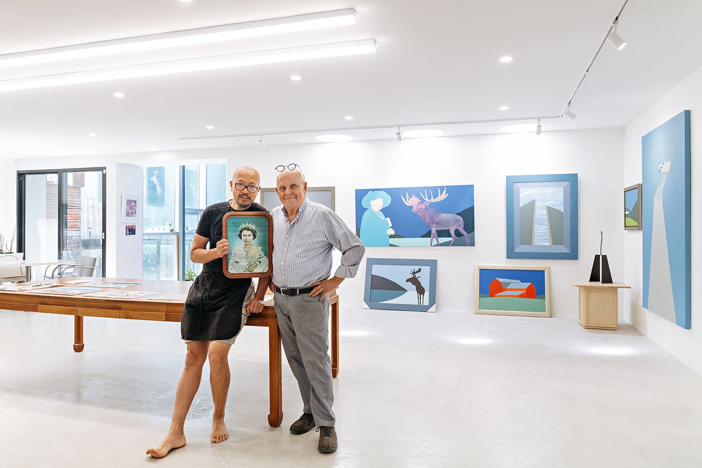 Charles Pachter (right) and husband Keith Lem in the main gallery space