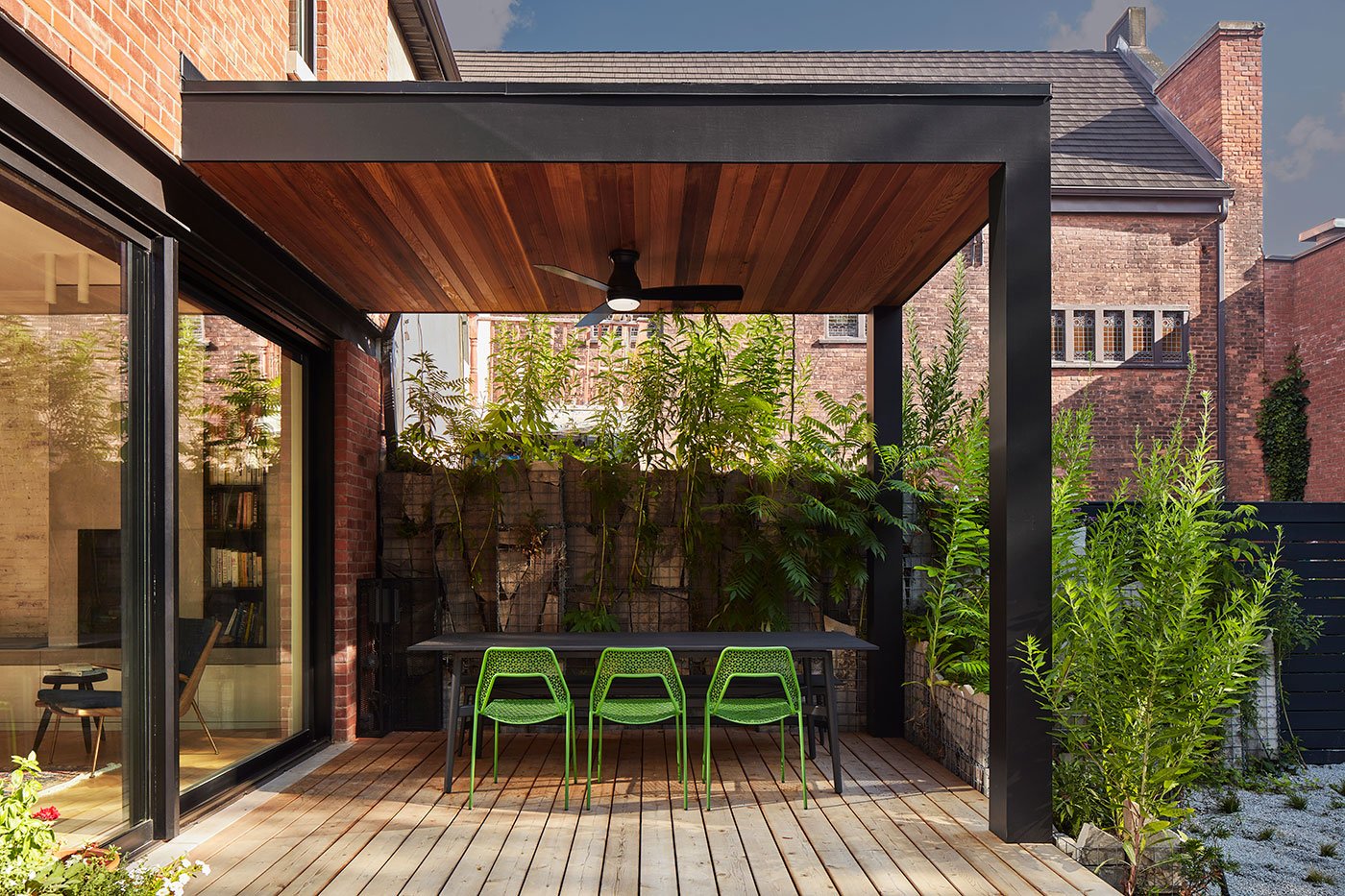 Covered ceder terrace with green roof. Interview with Gloria Apostolou & Jennifer Kominek
