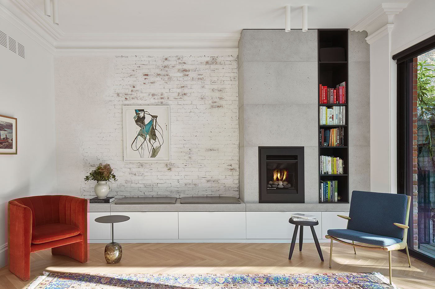 Brick veneer, fireplace and art on wall, design by Jennifer Kominek