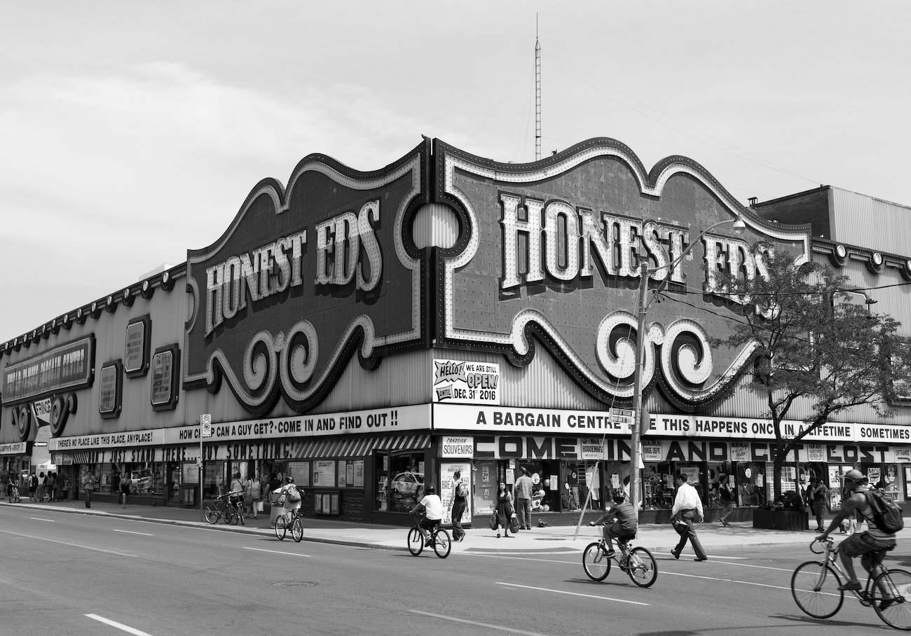 The outside of the Honest Ed's Store in Toronto during the day.